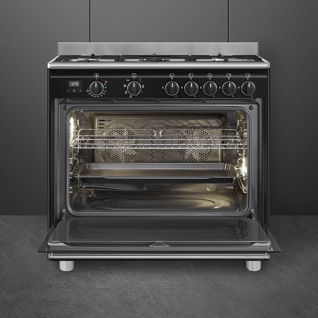 Piano de cuisson mixte Smeg BG91N2 noir — 90 cm, 5 brûleurs gaz, four chaleur tournante 115 L, Vapor Clean et classe A